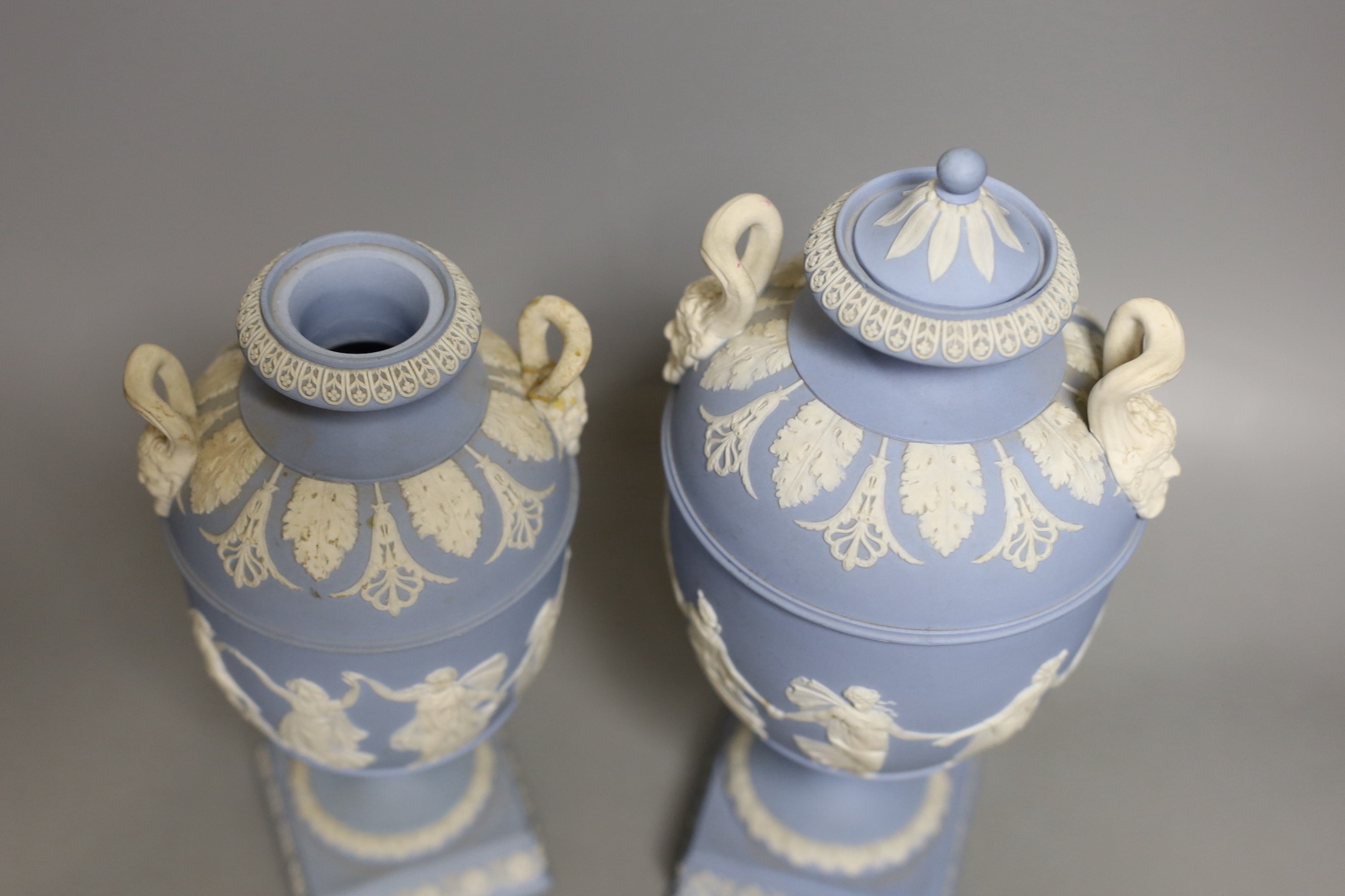 A 19th century Wedgwood blue jasper vase and another smaller c.1900, latter without cover, 26 cms high (including cover)